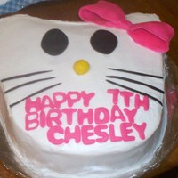 Hello Kitty 8X8 square vanilla cake carved for better shape. Iced in buttercream, with fondant accents. Birthday girl loves Hello Kitty. I was doing...