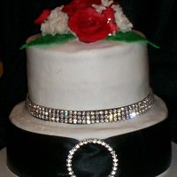 My Blingy B-Day Cake For my 30th B-day I decided I wanted a cake that sparkled. Boy ,did I get it! This was a 8" Red Velvet cake and 6" Vanilla, iced...