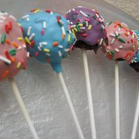 Brownie Pops Brownie balls covered in chocolate and sprinkles