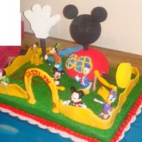 Mickey Mouse Clubhouse This cake was made for my niece who loves Mickey Mouse. I created the clubhouse by looking at a picture. I thought that the fence archway...