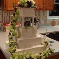 Square Wedding Cake This was my first wedding cake and I was very excited to be asked to make something so big and special for my cousin. The cake is a white...