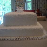 50Th Anniversary This is just a plain and simple anniversary cake. The cake is white with lemon curd in the middle to keep the gold theme going. If I could...