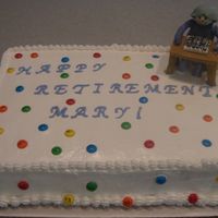 Bingo This cake was made for a lady who was retiring and she loved to play bingo. I made a figuring of her playing bingo, a table, and a chair...