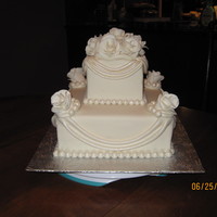 40Th Anniversary 40th Anniversary cake....a bit more of a modern version of their wedding cake that had real ribbon swag type things on it. This was my...