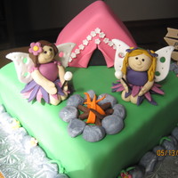 Camping Fairies This cake was for a little girl having a camp out birthday, but loooves fairies....thanks to bmote1 for making such cute fairies, I had to...
