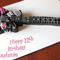 Electric Guitar Birthday Cake Replica of a Hagstrom Nitro electric guitar for a 12th birthday. Everything edible except fo rthe guitar strings. Gumpaste versions of the...