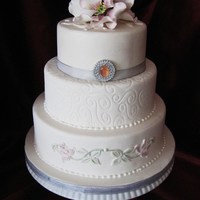 Touch Of Flora Three-tier dummy cake I made so that I could play with some of my cake toys. :) White poppies brushed with pink petal dust for the topper,...