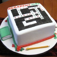 Crossword Puzzle Cake Birthday cake for a fan of crosswords! Colours and title of puzzle celebrate Portuguese nationality. Edible dictionary and pencil.