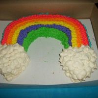 Somewhere Over The Rainbow My daughter's 14th bday cake. Rainbow w/ heart shaped clouds. Buttercream /yellow cake