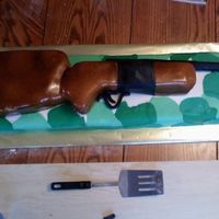 Rifle I hated this cake....from start to finish it was a nightmare. I made if for my best friends brohters birthday. He is a mans man who loves...