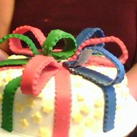 My First :) This is the very first cake that I ever attempted to make! I loved it even though the ribbons all ended up breaking!! I had made them too...