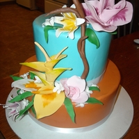 Tropical Flowers MMF cake, all gum paste flowers, lots of fun to create! Thanks for looking!