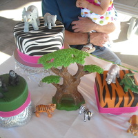 Jungle Theme! Not the best pic, but that's okay! Fondant with toy animals as decor. Thanks for looking!