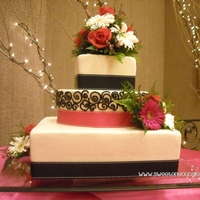 Enchanted Hot Pink & Black done elegantly! I thought it turned out beautiful! Looking back, with the round cake in the middle, it probably should...