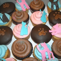 Kitty Cat Cupcakes Kitties are fondant, dark chocolate cupcakes are covered in fondant. And buttercream! Thanks for looking!