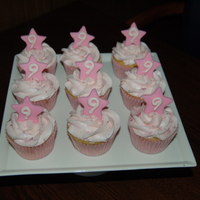 Pink Cupcakes These were yellow cupcakes with a chocolate filling. BC icing, fondant stars. The mom asked me to make cupcakes for her daughter's 9th...