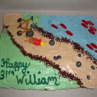 Mountain Biking Cookie Cake This was a joke cake for my husband's 31st b-day. He LOVES mountain biking but is infamous for falling ALL THE TIME. So, I made a big...