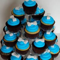 Tiffany Blue Birthday Cupcakes Requested for a friends birthday. She loves Tiffany & Co. Cake base in a mixture of Choc Mud, Cookies and Cream, Vanilla and Marble Mud...