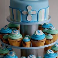 Blue Christening Cupcake Tower Christening Cupcake Tower created last weekend for a family friend. Tower included 8" marble mud cake cutting cake. 14 cupcakes that...