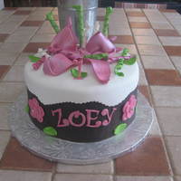 Zoey Last minute order for first birthday cake. Golden butter cake with an apricot/honey IMBC. Lots of fun with the girly colors! Thanks for...