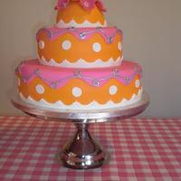 Pink And Orange Weding Cake For A Summer Wedding 