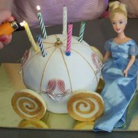 Beginner's Cinderella Carriage Cake I'm just a beginner, so don't judge too harshly! This is my first Cinderella carriage cake using a sports ball pan. The cake is...