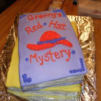 Cakes_042.jpg My first attempt at books, This was for my grandma, an avid reader. The second book was titled "Death By Sugar" written on the...