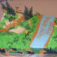 Dscf1957.jpg This was a fun one, I used the plastic deer hunter cake topper. This cake was so heavy. I used 6 pounds of powdered sugar for the...