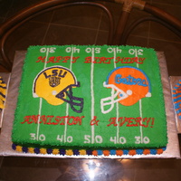 Football And Pom Poms FBCT for the helmets. Piped pompoms with buttercream on 1/2 ball pans.