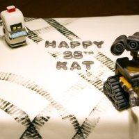 Wall-E And M-O Birthday Cake I made this cake for a friend of mine that wanted to surprise his wife for her birthday. The cake portion is very simple it's just a...
