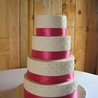 First Four Tier Buttercream Cake All buttercream with real ribbon.