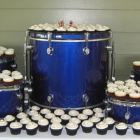 Wedding Cupcakes 200 cupcakes for a wedding. bride/groom provided the ceramic squirrel toppers. The groom is in two bands and the cupcakes were displayed on...