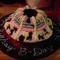 Caurosel Cake My daughter turned eight and I wanted to make her somthing special, So I made her this! And had alot of fun doing it.