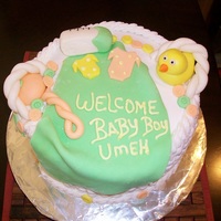 Basket Baby Shower Cake This is a yellow cake with buttercream icing. The handles and contents of the baskets are mmf. Thanks for looking!