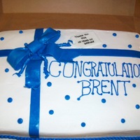 Blue And White Cake This is a 12x18 WASC cake with buttercream icing. The bow is mmf. Thank you for looking!