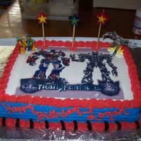 Transformers French vanilla cake with butter cream icing and sugar paper transfer.