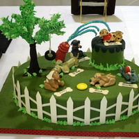 Man's Best Friends At Play This cake won first place adult advanced novelty cake at the Austin cake show February 2010.