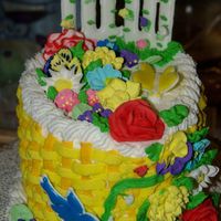 2Nd Course Cake This is a peanut butter and jelly oval cake. It was my first basketweave and has more flowers than a flowershop! The bird and fence are...