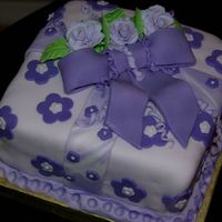 My First Fondant Cake This is my favorite cake from my classes thus far. I think I would have left the roses off, because they're a little too much look for...