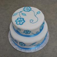 Flowers Made this cake for my friends mother's 65th birthday. It was my first tiered cake. Also my first time trying brush embroidery. I loved...