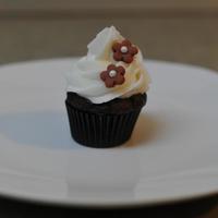 Mini Cupcake With Flowers Not an original idea but I just find them so elegant. Made 50 for an engagement party. Darn Good Chocolate cake recipe with buttercream...