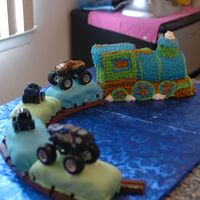 Train Cake I made this train cake for my sons 3rd birthday. He was having a monster truck birthday but we rented a trackless train to come take the...
