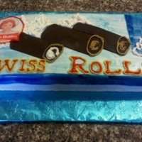 Little Debbie Swiss Rolls Birthday girl loves Little Debbie swiss rolls, so I recreated the box out of cake. : )Chocolate cake w/ cream filling covered in vanilla...