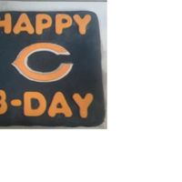 Chicago Bears My father in law is a HUGE Chicago Bears fan. This was a surprise andhe loved it!!! My first cake using fondant and it turned out great...