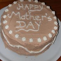 Mother's Day Cake A simple chocolate cake with chocolate buttercream & buttercream piping.