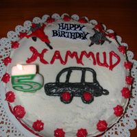 Simple B'day Cake Chocolate cake with chocolate chips covered with vanilla buttercream.