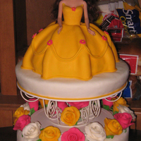 Princess Belle I made this cake for my daughter's sixth birthday, she loves disney princesses and she wanted a belle doll cake for her party. Two...