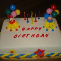 Clown Birthday This is my first cake that I covered in MMF. It was really fun to work with and boy does it taste much better than regular fondant. The...