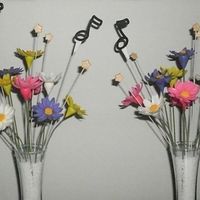 Centerpieces For My Daughter's Birthday Party These are the centerpieces that I made for my daughter's birthday party. They are all gumpaste and the colors are done to match the...