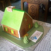 Little House Cake I made this for a home inspector for one of his clients. They loved it. Cocolate cake with carmel filling